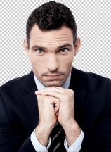 Businessman posing to camera while having a deep thought
